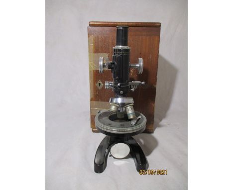 A Cooke, Troughton &amp; Simms microscope in mahogany carry case