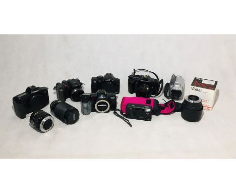 An assortment of various cameras and lenses including Canon, Minolta, Olympus etc.