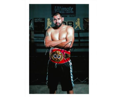 ERIC MOLINA signed Boxing 8x12 Photo. Good condition.  All autographs come with a Certificate of Authenticity. We combine pos