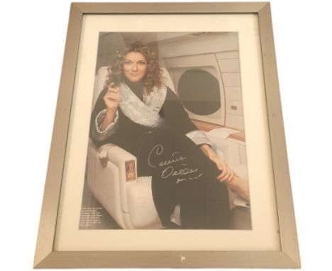 Celine Dion signed colour photo. Mounted and framed, measures 15x11 appx. Good condition.  All autographs come with a Certifi
