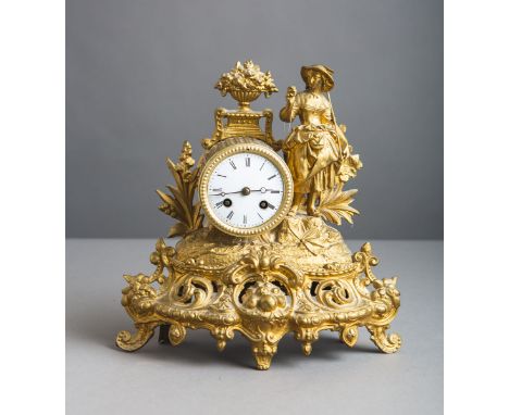 Tischuhr / Kaminuhr (Frankreich, 19. Jh.), Metallguss (goldfarben), Pedulenwerk m. Schlagauf Glocke, figürl. Aufsatz "Gärtner