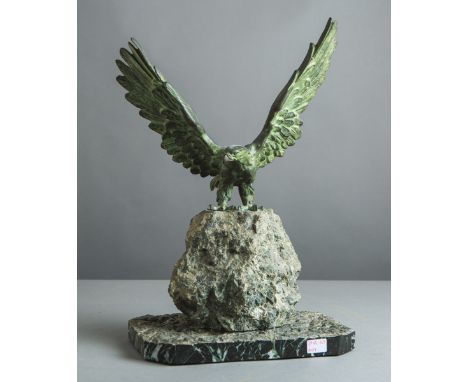 Buttler, K. (20. Jh.), Bronzeadler, auf naturalistisch gestaltetem Granitsockel, an d.Basisplatte sign., H. ca. 50 cm.