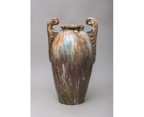 Bodenvase (wohl 30er J.), Keramik, polychrome Laufglasur, in Urnenform m. seitl.angesetzten Henkeln, Gr. ca. H: 47 cm.
