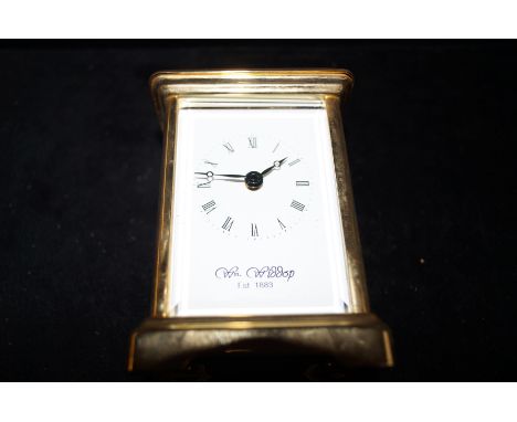 Brass carriage clock Wm Widdop. Good working order