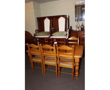 Rectangular turned leg dining table and six ladder back chairs together with a pair of arched back elbow chairs.