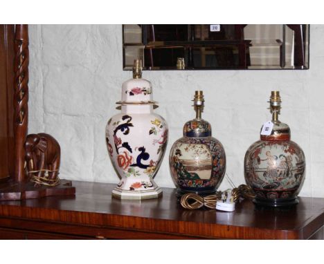 Pair of Oriental pottery table lamps, Masons lamp and carved wood lamp.