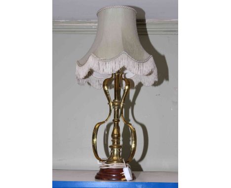 Wood and brass triform lamp with shade.