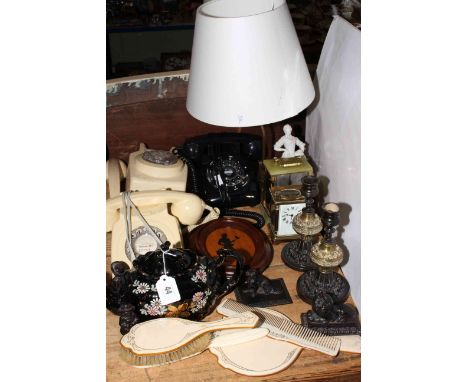Three vintage telephones, vanity set, two carriage clocks, metalware, teapot.
