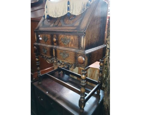 A 1920s oak bureau.