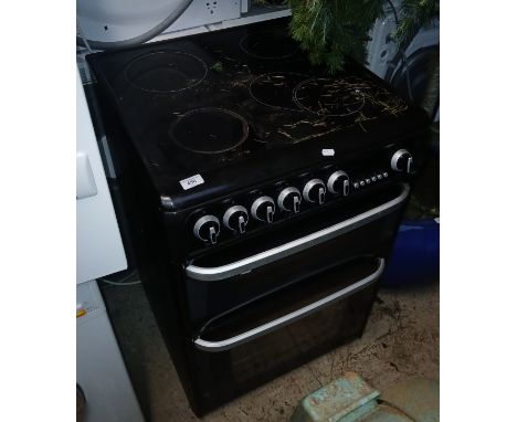 A Cannon Hotpoint electric double oven cooker with ceramic hob - no power lead, and untested