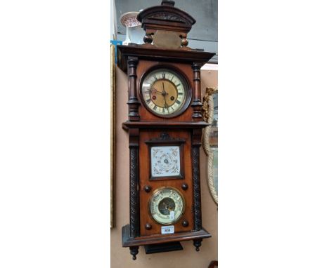 A 19th century wall clock/barometer with plaque for 1896.