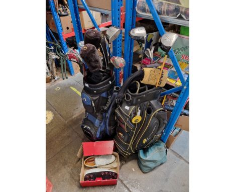 Two golf bags containing a number of clubs, mainly drivers (2 Taylormade &amp; 1 Ping), woods etc together with a pair of Dex