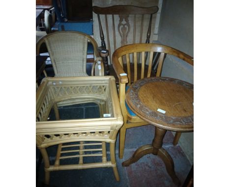 A mixed lot of furniture comprising a farm house chair, tripod table, cane glass top table, cane chair etc.