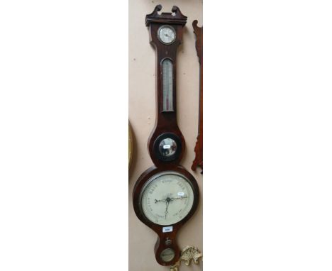 A 19th century rosewood banjo barometer.