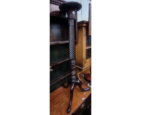 A 19th century mahogany torchere plant stand, height 111cm.