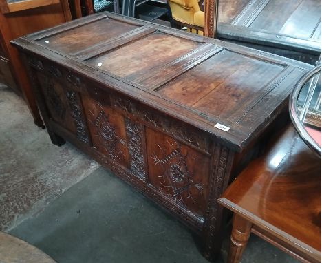 An 18th century oak coffer, length 121cm, depth 60cm &amp; height 66cm.