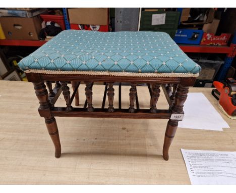 A Victorian mahogany piano stool.