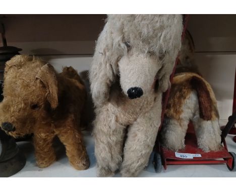 A vintage toy push along dog and 2 other vintage dog toys