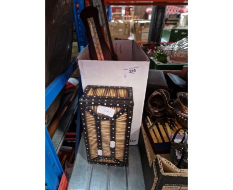 A box containing 4 barometers and a quill box