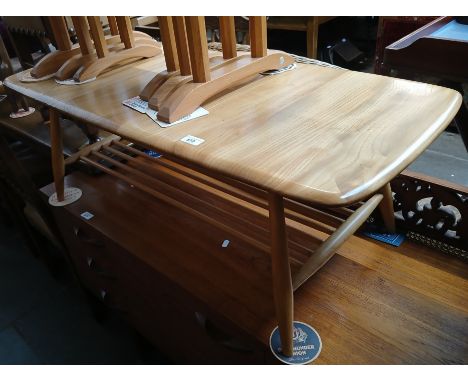 An Ercol light elm coffee table, model 459.