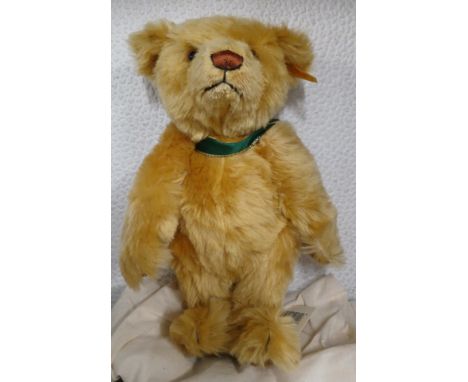 A Steiff bear, Bear of the Year 2001 with bag.