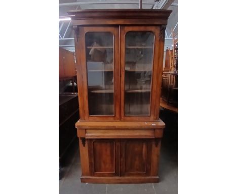 A mid 19th century glazed cabinet bookcase, width 105cm, depth 40cm &amp; height 206cm, together with a lamp standard.