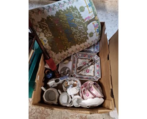 A box of collectables including Royal Doulton 'Childhood Memories' figurine, vintage Camel table lighter, a sampler and a bar