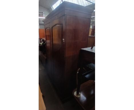 A late Georgian mahogany wardrobe, width 130cm, depth 61cm &amp; height 204cm.