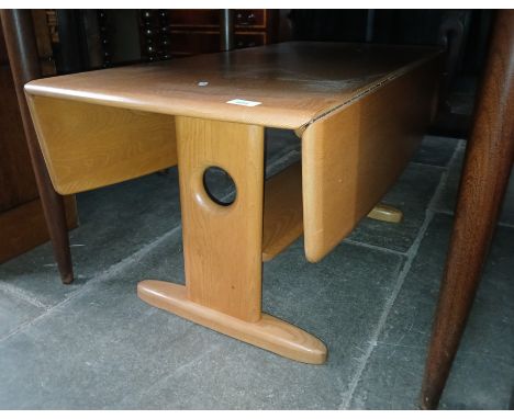 An Ercol light elm and beech coffee table. 