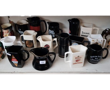 15 advertising water jugs including Gilbeyâ€™s Gin, Guinness, Wem Special, Dunhill etc.