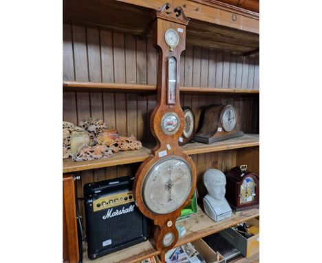 An Oak cased barometer 