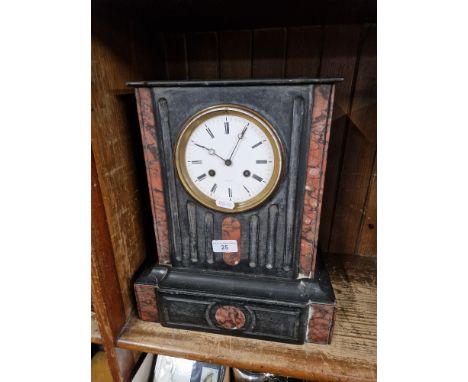A slate mantle clock 