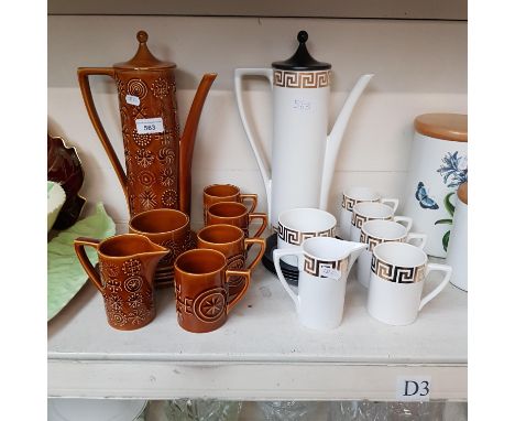 2 Portmeirion coffee sets in the Totem and Greek Key designs.  Each comprises a coffee pot, 4 cups and saucers, milk jug and 