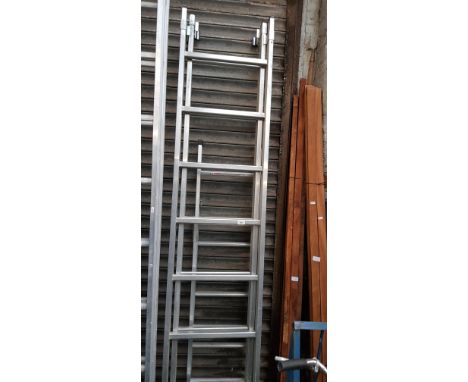 An aluminium step ladder and a similar extension ladder 