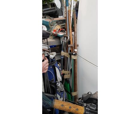 2 bundles of garden tools and a sack truck
