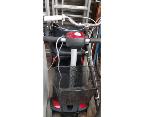 A mobility scooter with charger 