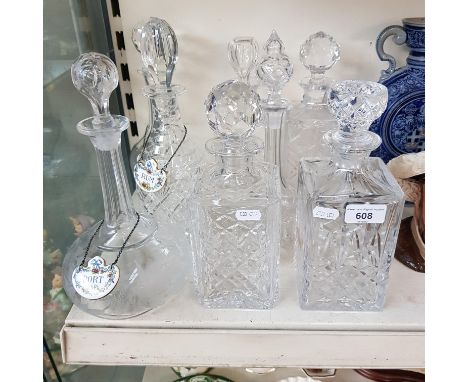 8 glass decanters including Royal Doulton together with 3 ceramic decanter labels