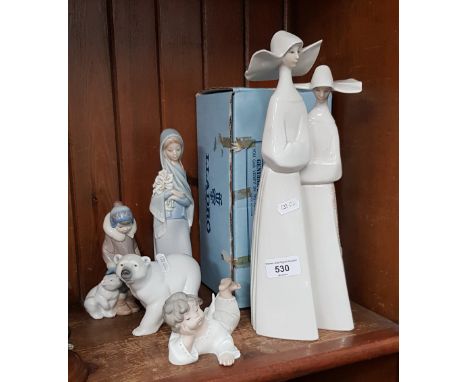 Lladro porcelain - 5 figurines including a boxed â€˜Girl with Calla Lilliesâ€™ (4650) issued 1970-92, â€˜Angel Lying Downâ€™ 