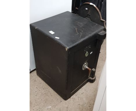 A vintage Cox safe with key 