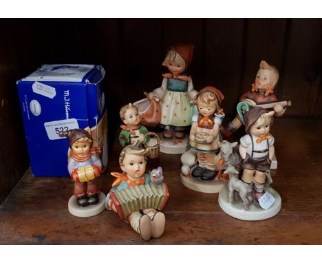 7 Hummel figurines - Happiness (1950-55), Motherâ€™s Darling (1957-60) Letâ€™s Sing (1964-72), Be Patient (1964-72), Little G