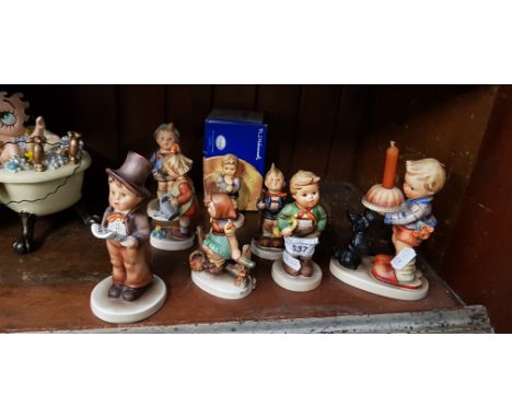 8 Hummel figurines - Street Singer (1950-55), Begging his Share (1957-60), Little Gardener (1960-72), Little Hiker (1960-72),