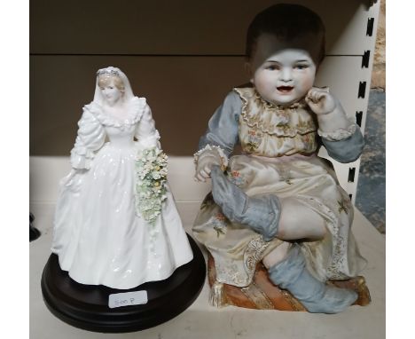 A German bisque piano baby and a Coalport figure Diana. 