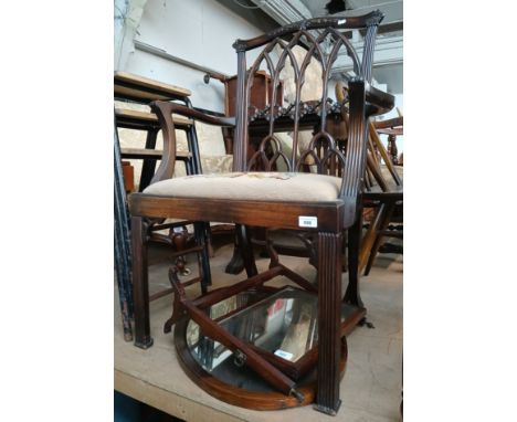 A Chippendale style mahogany armchair with tapestry seat and Gothic arches to the back. 