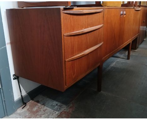 A McIntosh teak sideboard, length 214cm.