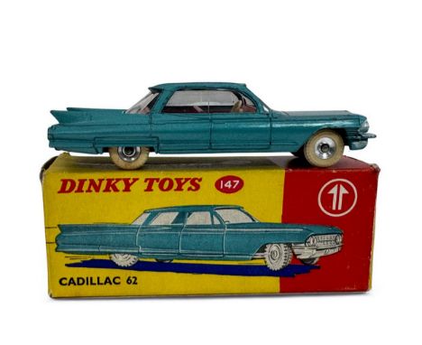 Dinky Cadillac 62 No. 147, metallic aqua blue, red interior with cream steering wheel, silver trim, chrome spun hubs with whi