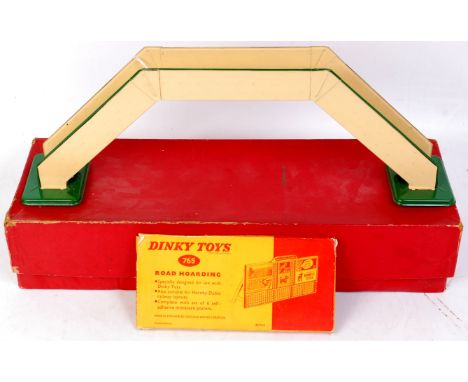 Hornby 1953-4 No. 1 footbridge, cream enamel, green lining, solid sides (NM-BG), with a Dinky Toys No. 765 road hoarding, com