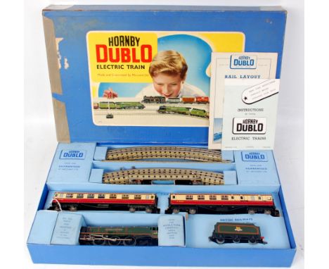 A Hornby Dublo EDP12 passenger train set containing matt green 'Duchess of Montrose' engine and tender, 2 D12 coaches, one wi