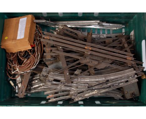 A large plastic crate of Marklin and Bing G1 3-rail track including points, acute angle crossing, Marklin 20 Volt controller 