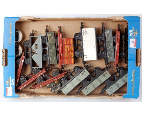 A tray of 13 postwar wagons including NE flat with container, NE flat, NE small letter No. 1 open, NE small letter wagon with