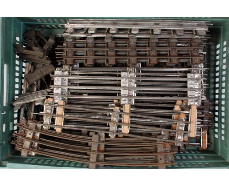 A large plastic crate of Marklin and Bing G1 3 rail track including curves, straights, 1/2 straights and 1/4 straights (G) 